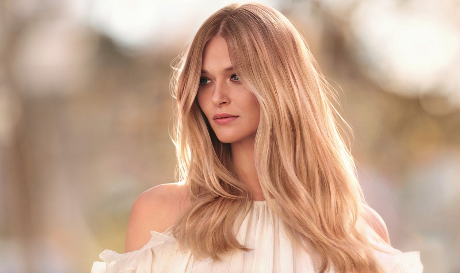 Model with long blonde hair styled at Salon E